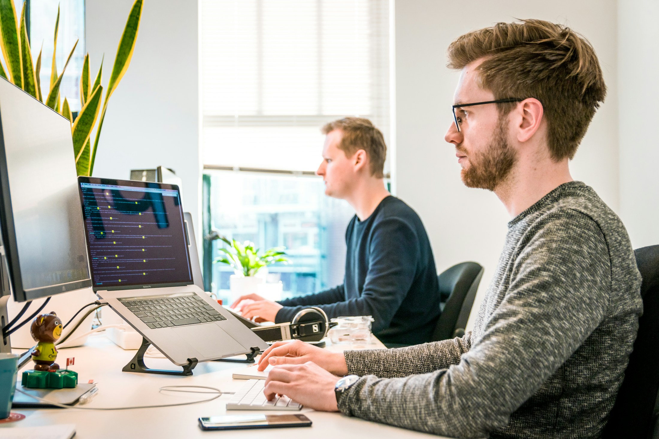 A high-performing team working together around digital service tools
