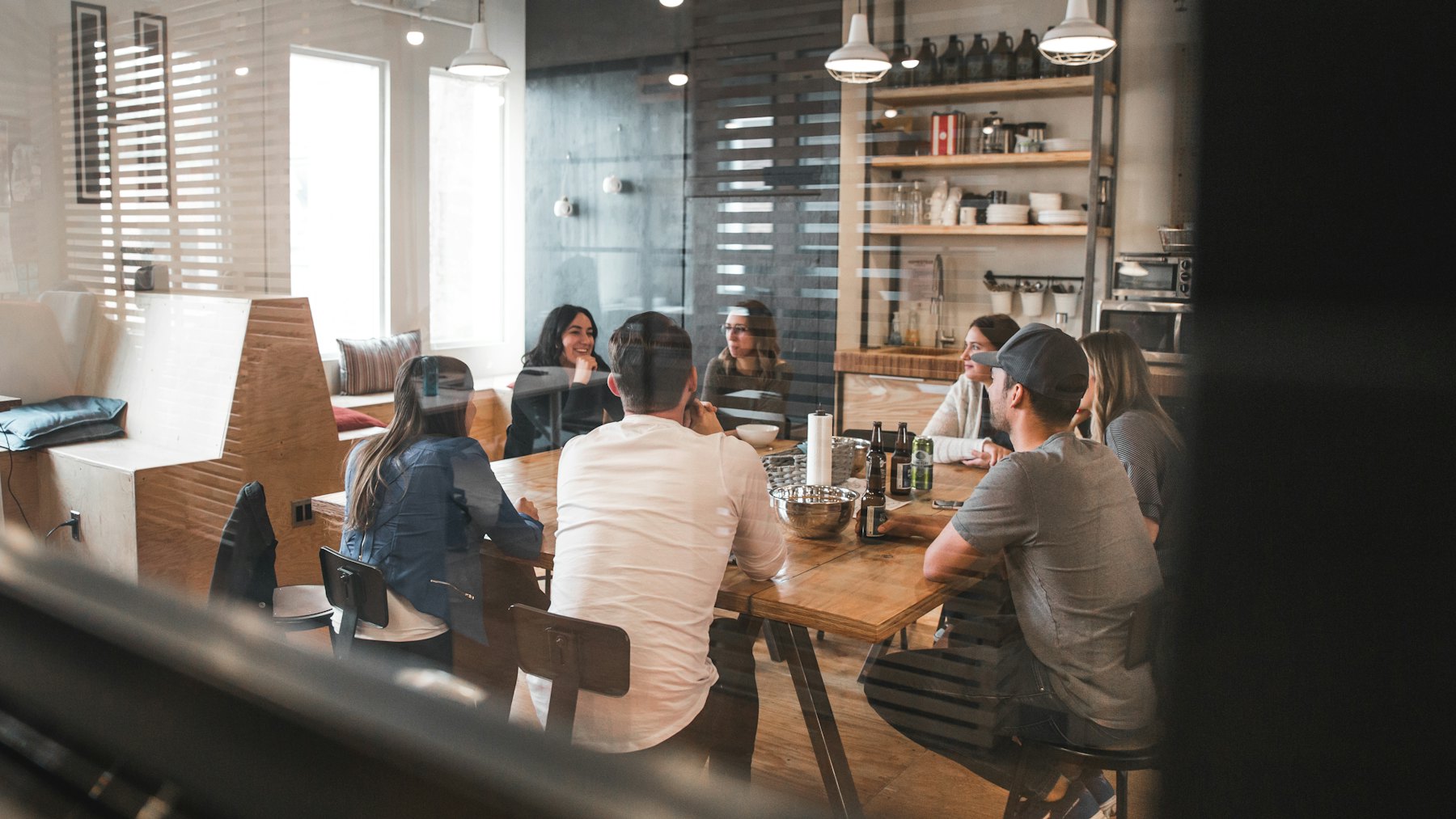 Modern office team collaborating around a meeting table